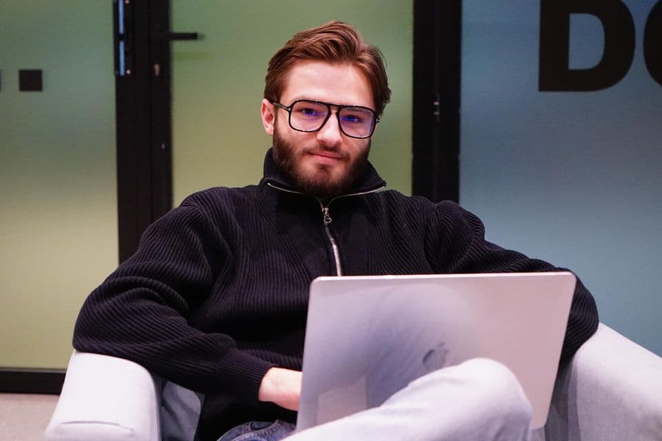 Oleg working at the office